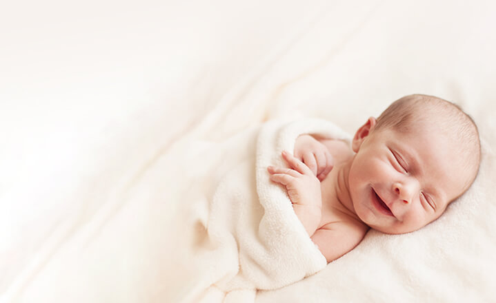 Smiling newborn